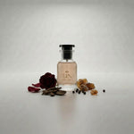 Frasco de perfume Arenas Rosas unisex de Reina Perfumes